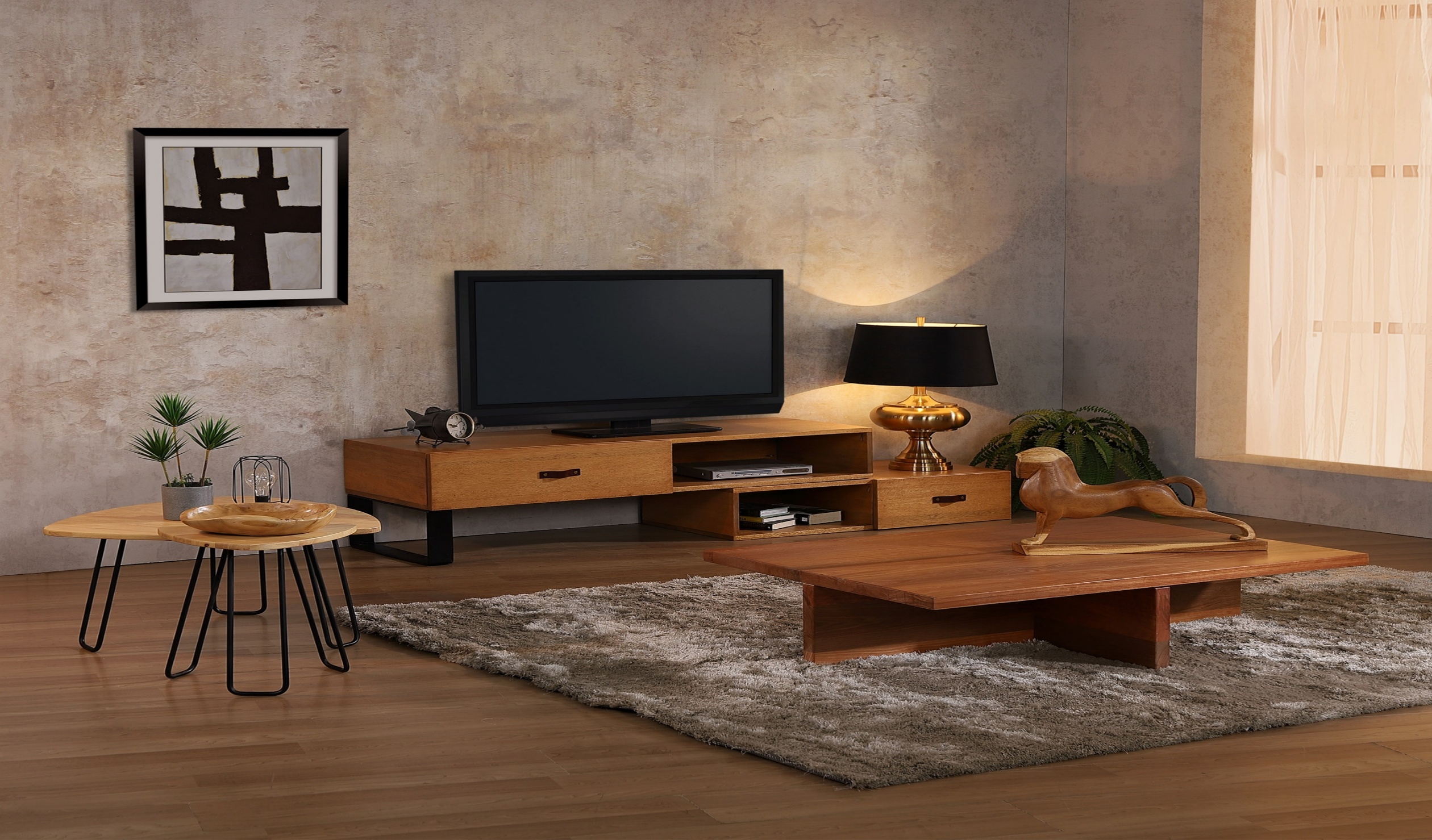 Solid wood TV console with a matching coffee table on a patterned rug